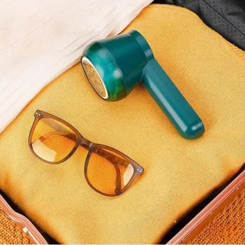 Aparat electric pentru curatat scame